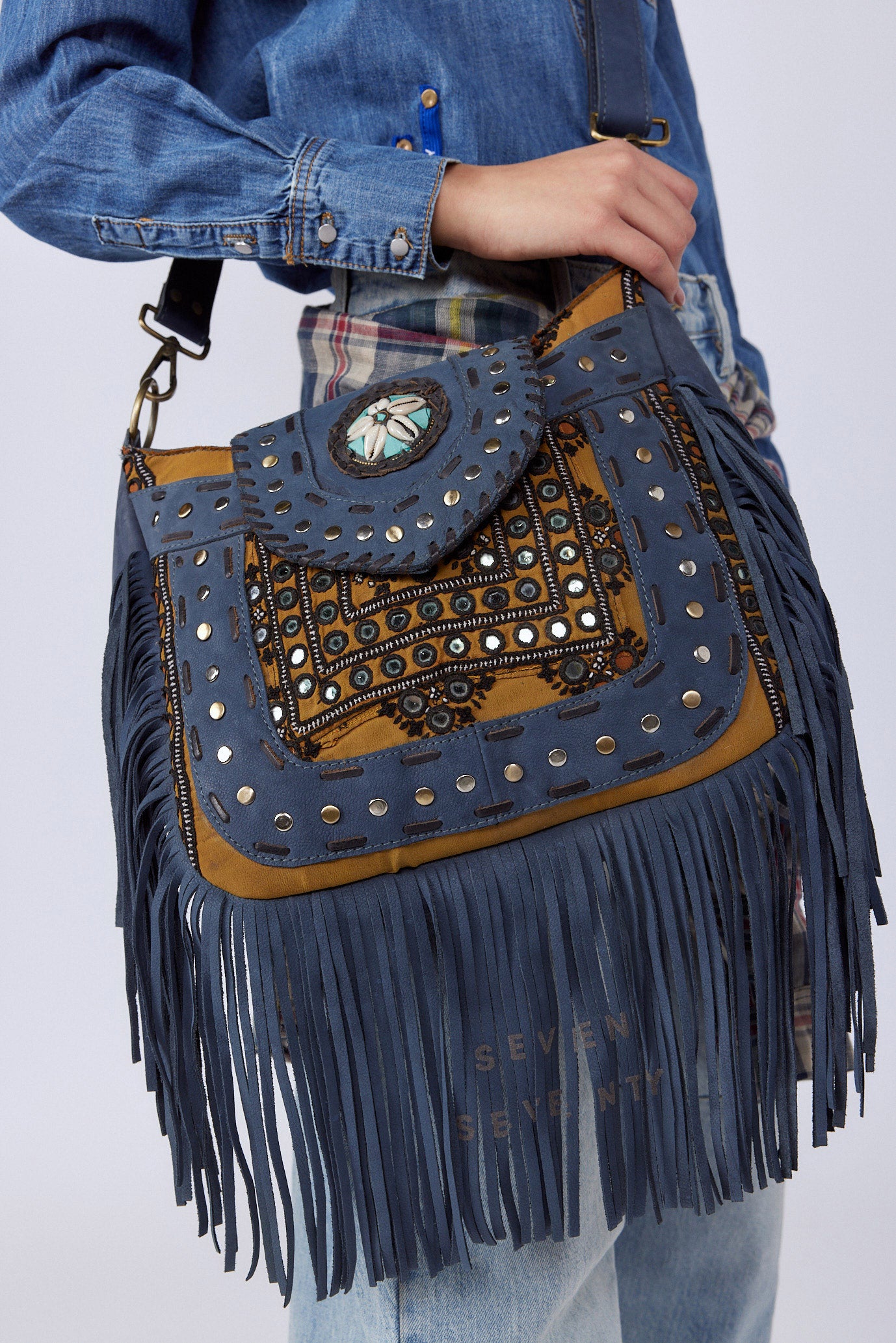 Genuine leather side bag with fringes and rivets SHELL