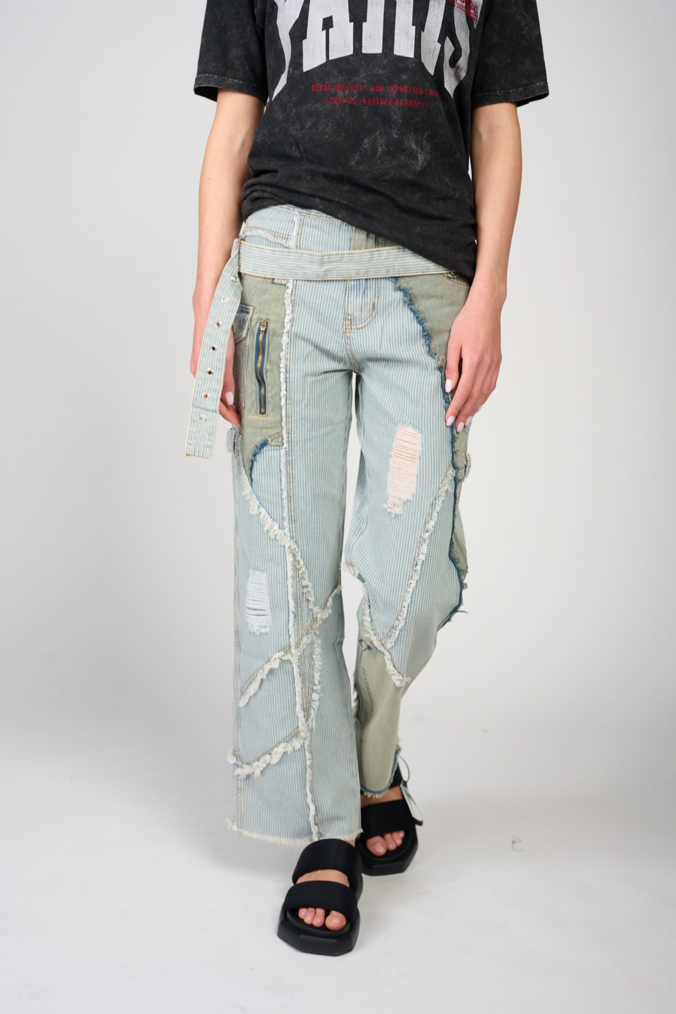 Striped jeans with a combination of rips 770
